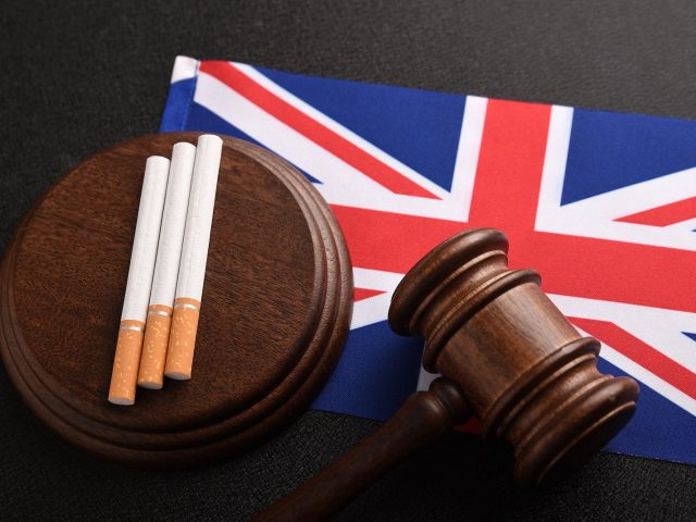 Flag Of Great Britain, Cigarettes And Judge Gavel. Tobacco Law I